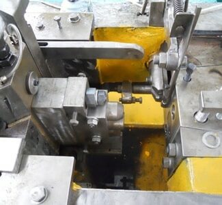 Hollow wall anchor screw forging machine structure